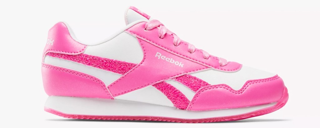 pink and white reebok sneaker