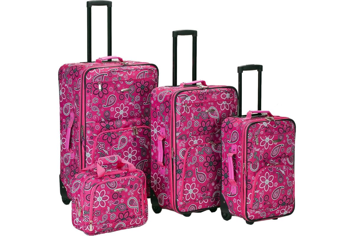 Rockland 4 piece softside luggage in pink bandana print