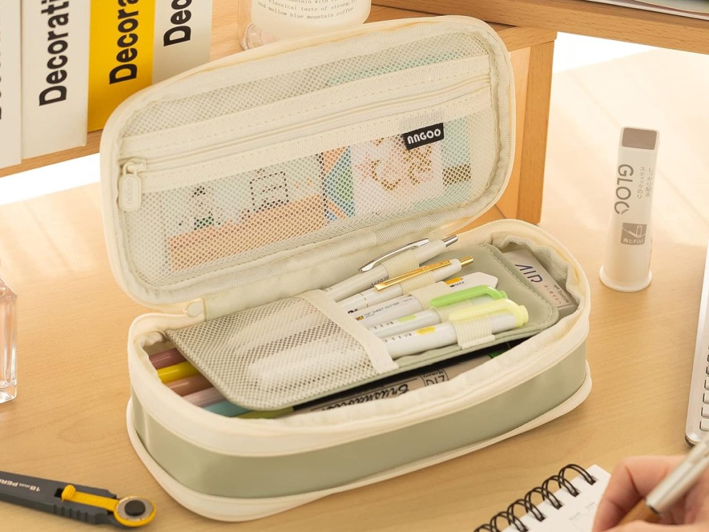 neutral pencil case with pencils in it