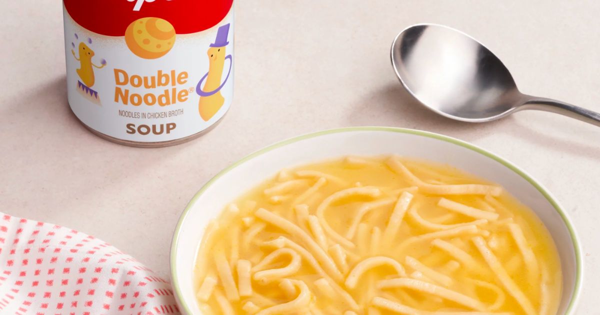 a can and a bowl of campbells double noodle chicken soup