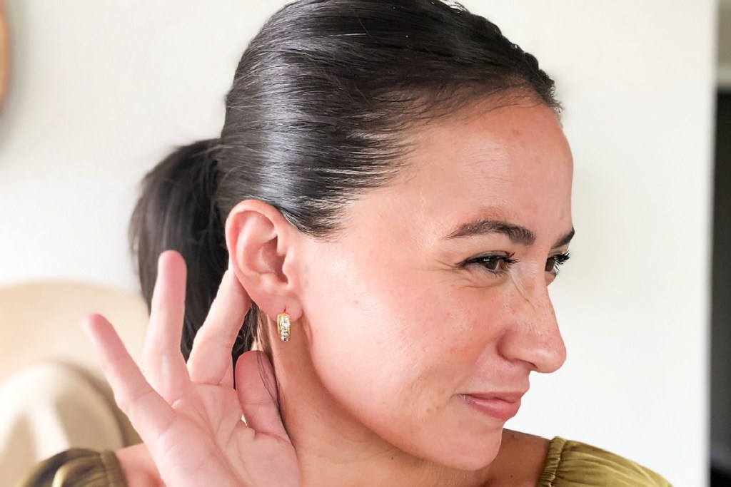 woman wearing cate & chloe giselle hoop earrings