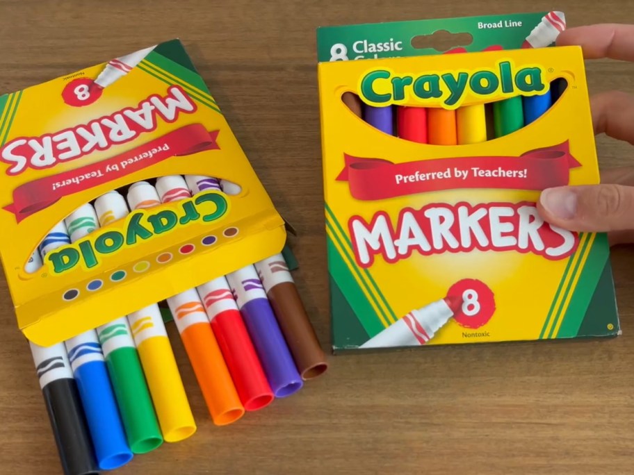 two boxes of crayola markers