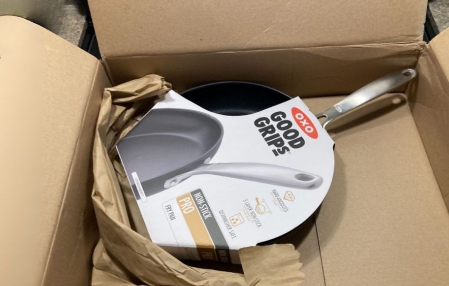 a frying pan in cardboard box for shipping