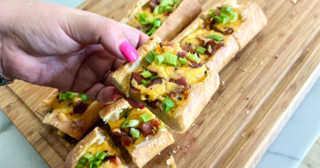 holding a slice of bread egg boats