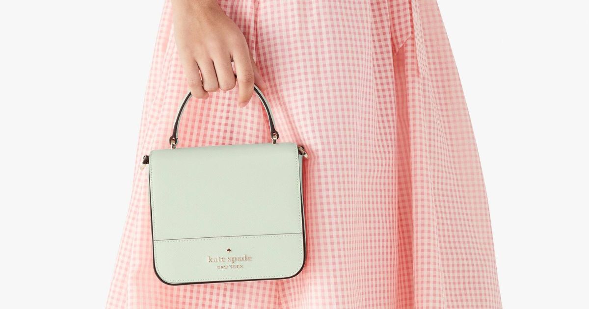 woman in pink and white checkered dress carrying mint green kate spade square bag