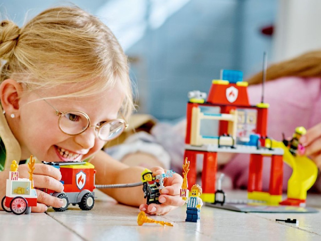 kids playing with LEGO City Fire Station and Fire Engine Set