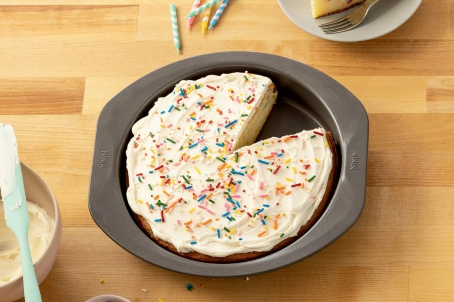 a 9 inch round cake pan with a cake in it