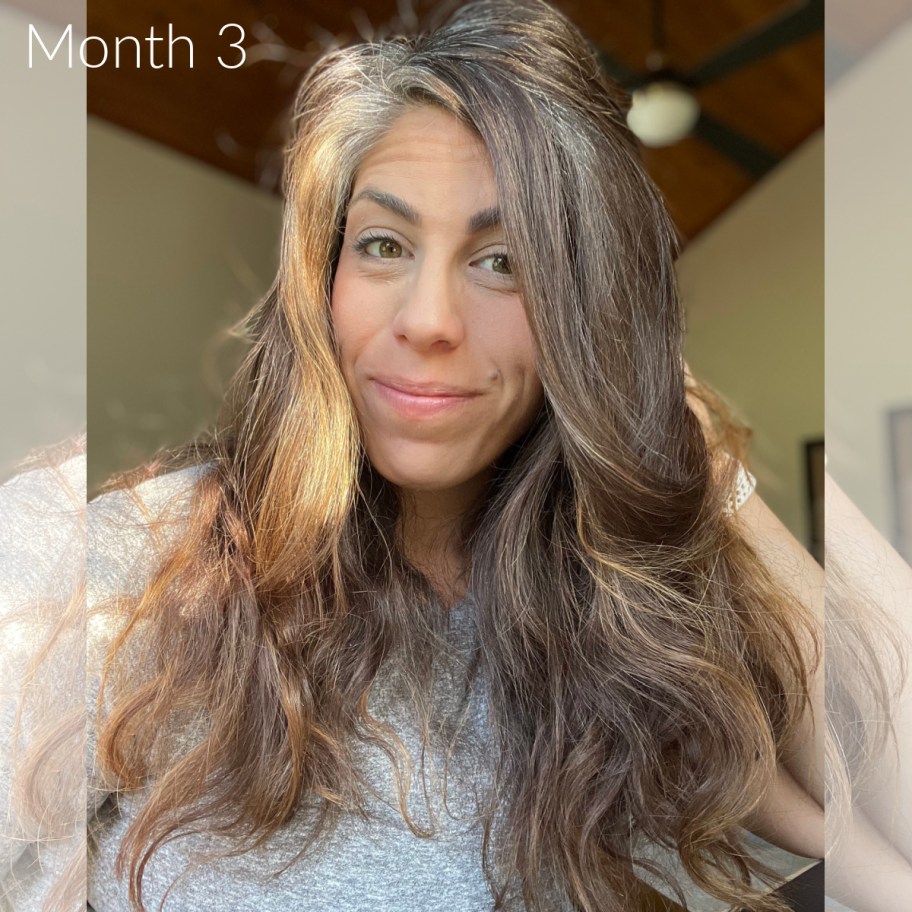 woman showing curled natural hair during no poo challenge