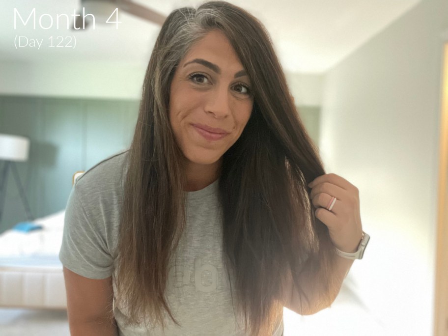 woman showing unwashed hair during no poo challenge