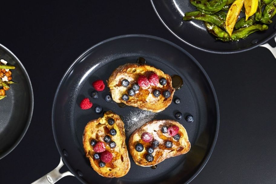 oxo fry pans with various dishes cooking in them