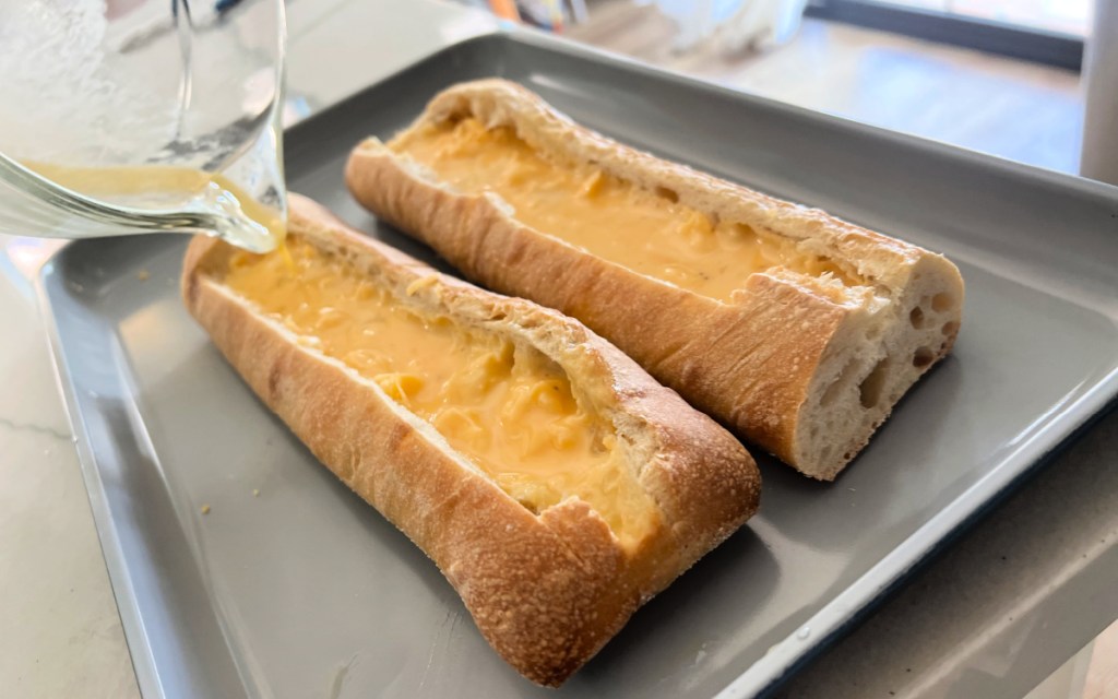pouring eggs into bread loaf