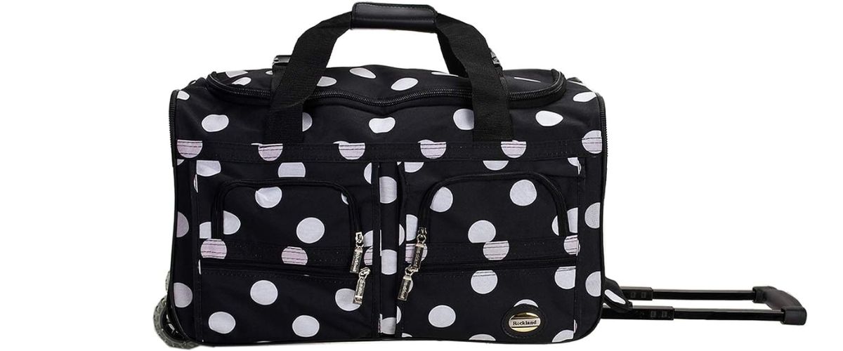 rockland rolling duffel in black with white polka dots 