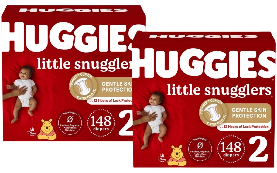 2 red and white large boxes of Huggies little snugglers diapers with a picture of a baby on them