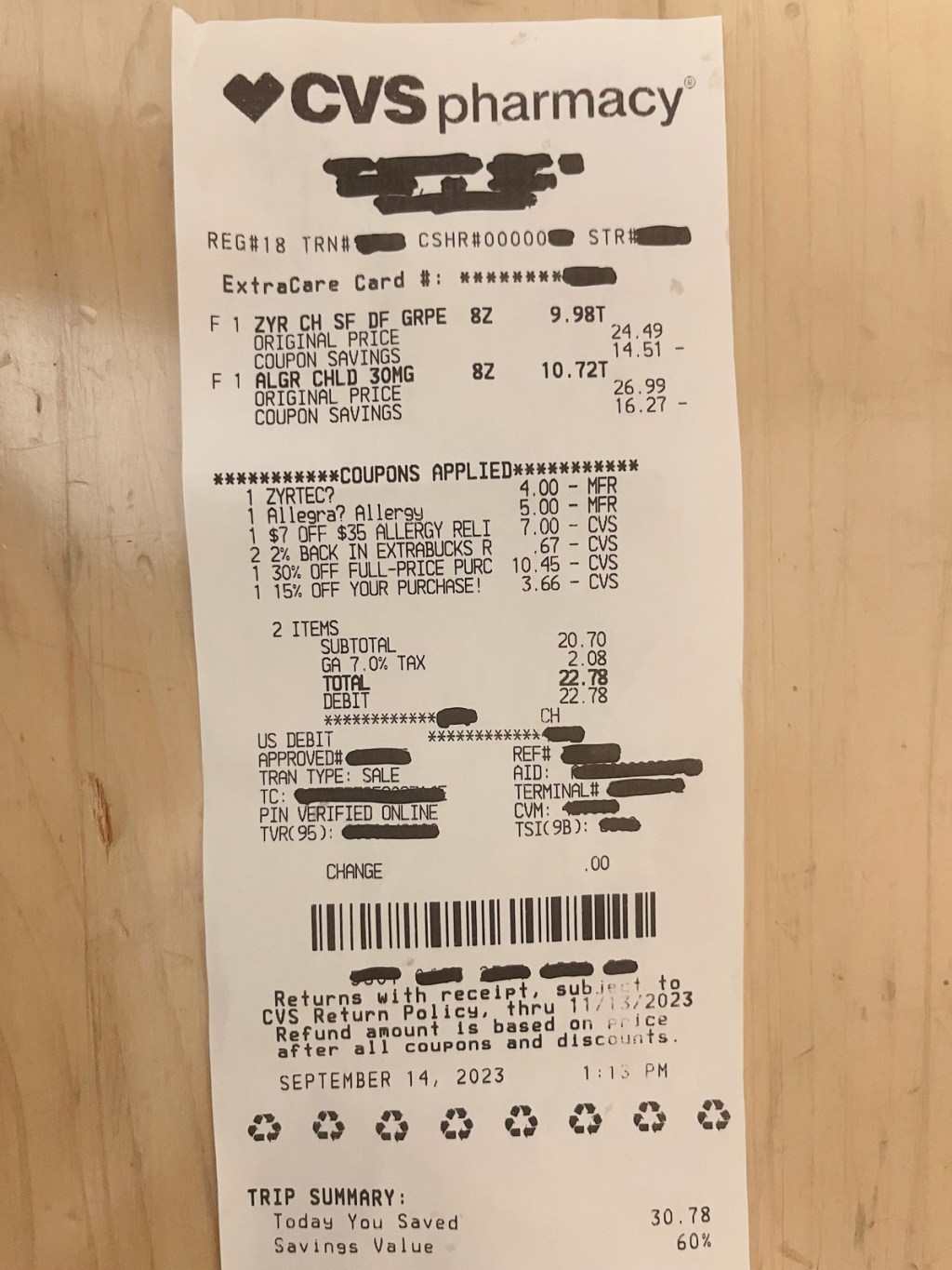 CVS receipt showing 60% savings on popular brand name allergy medication