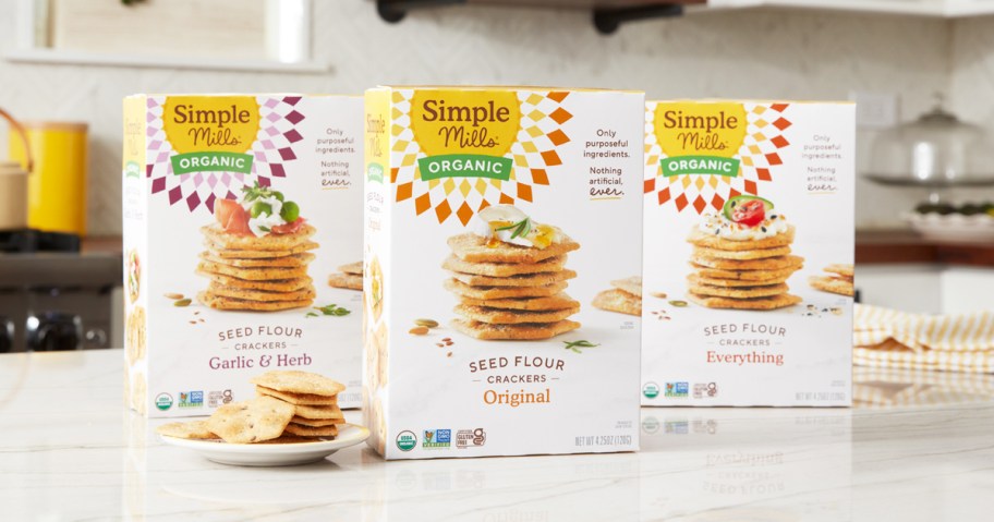 three boxes of Simple Mills Seed Crackers on kitchen counter