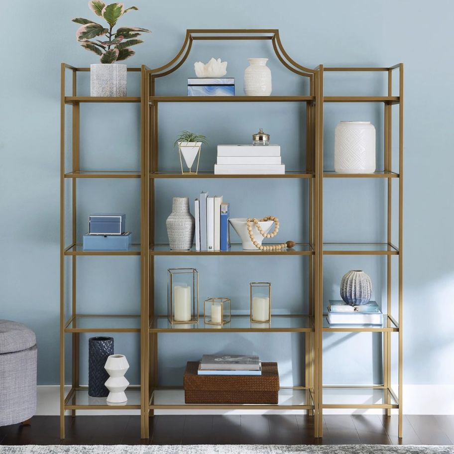 2 nola narrow bookcases shown with nola etegere