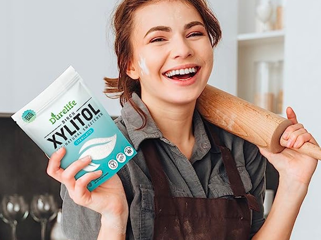 woman holding xylitol sugar bag