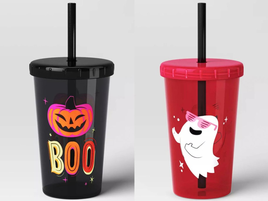 black tumbler with pumpkin and pink tumbler with ghost