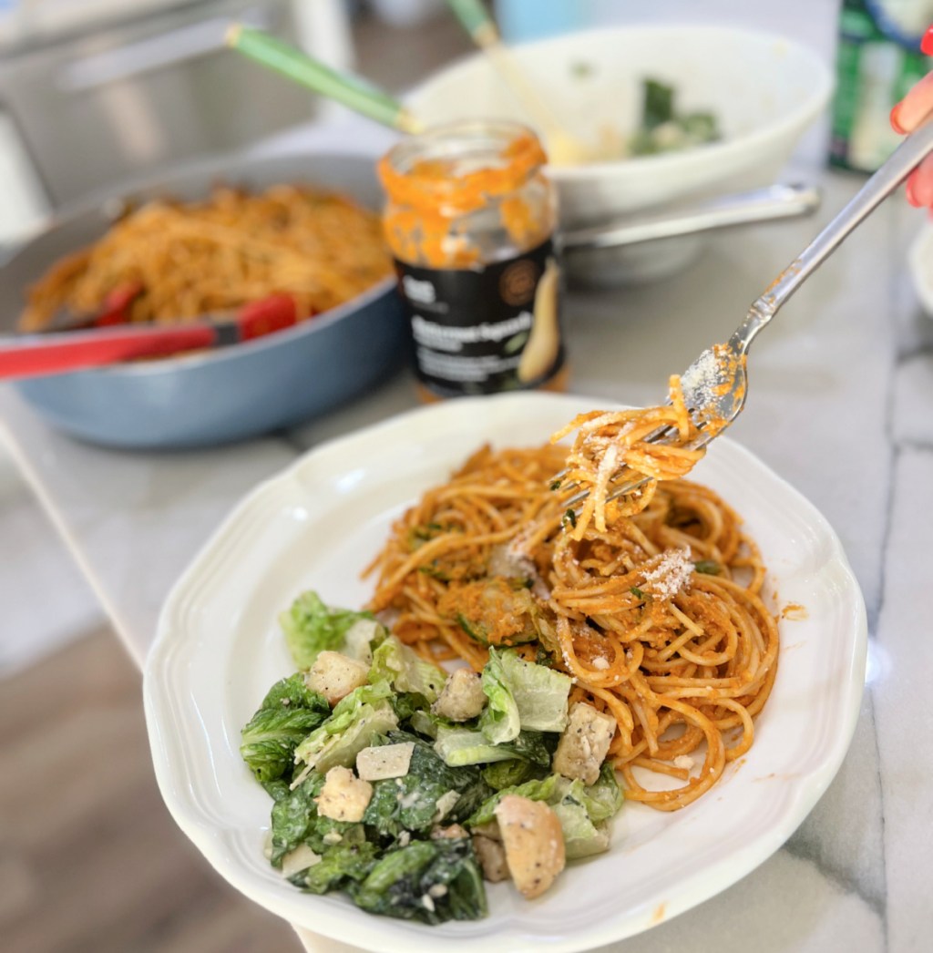 plate with pasta and salad