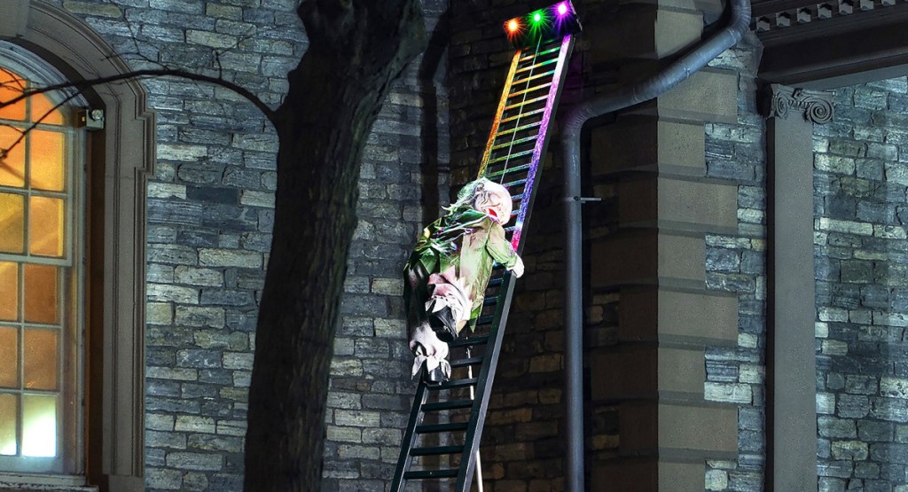 zombie climbing ladder outside of home with bold colors displayed