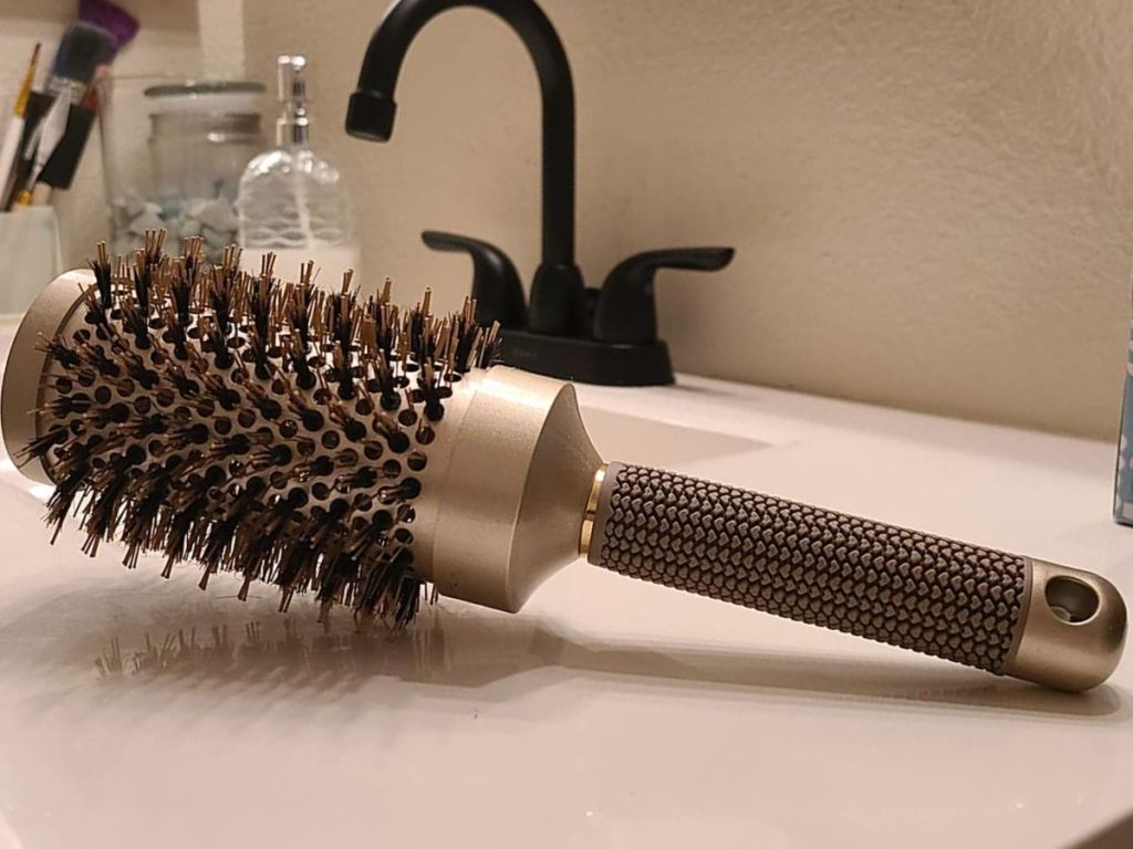 An Amike Hairbrish on a sink