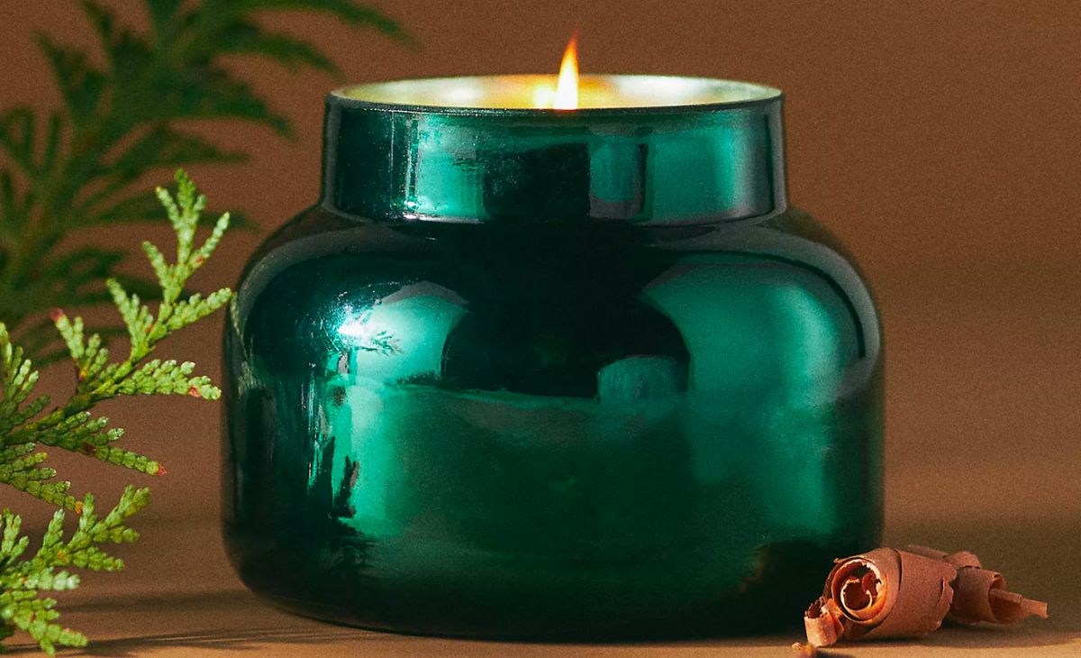 Capri Blue Fir &amp; Firewood Tin Candle stock image