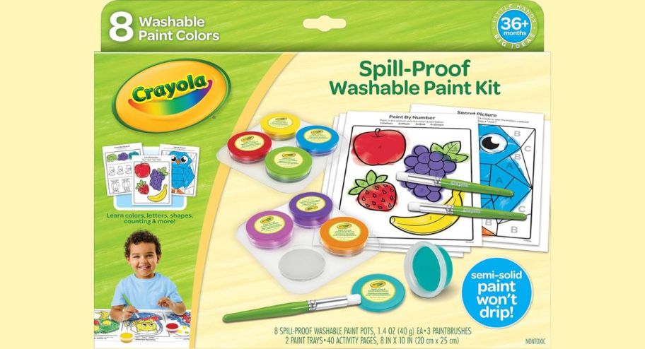 Crayola paint box with a yellow background