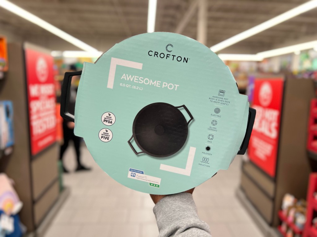 person holding up Crofton Awesome Pot in black inside ALDI