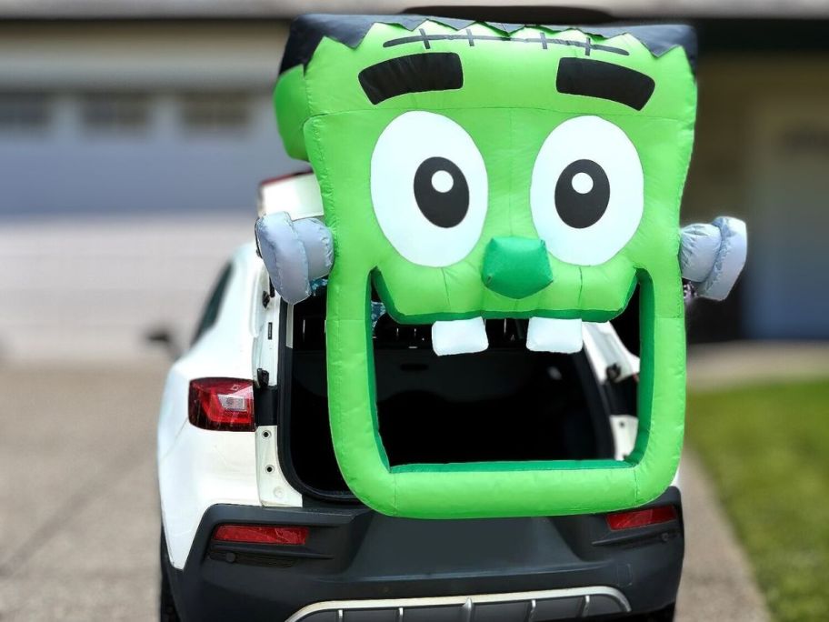 car with frankenstein inflatable as part of the trunk