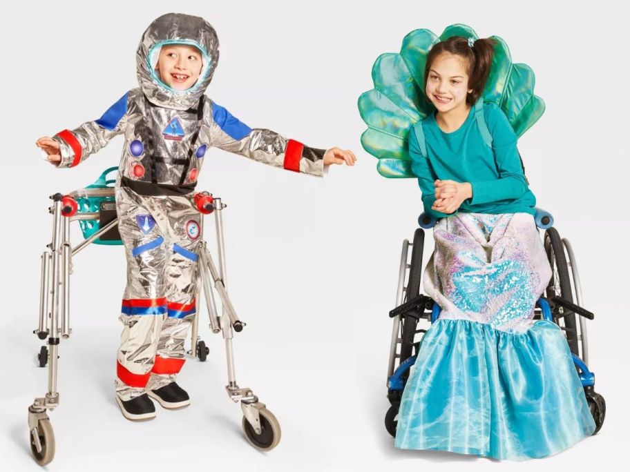 2 happy kids wearing Halloween costumes