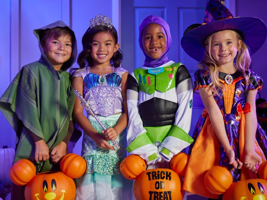 Kids Trick or Treating in disney costumes