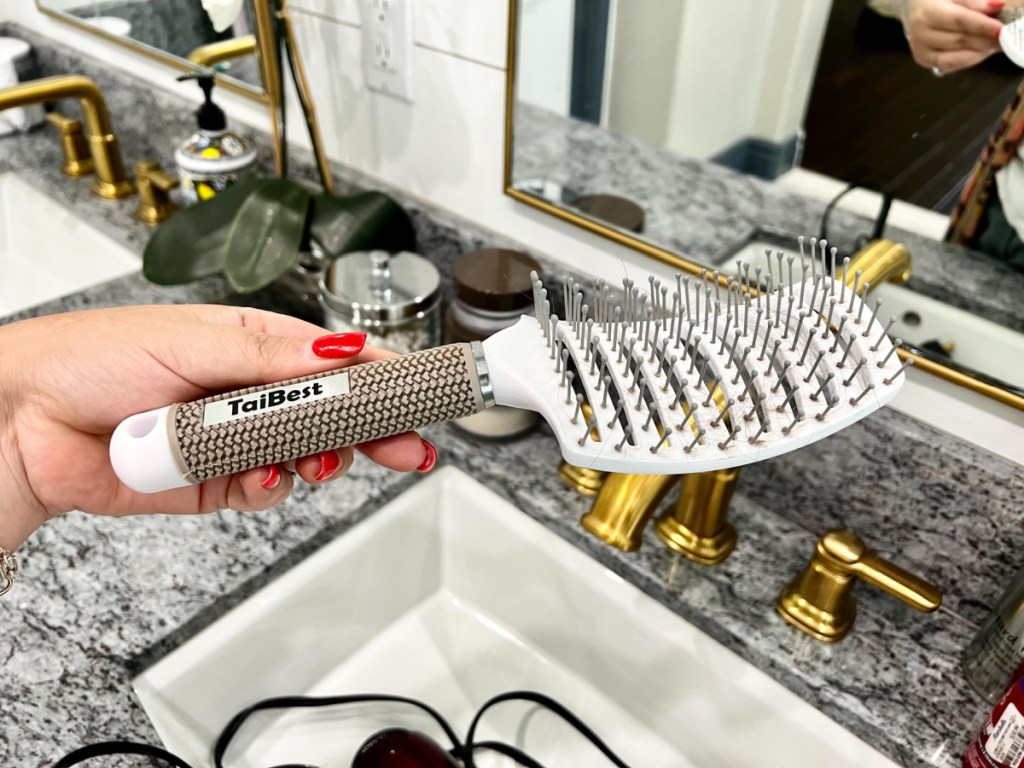 woman holding white TaiBest White Brush