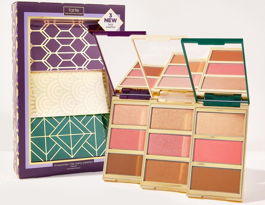 three tarte face palettes near gift box