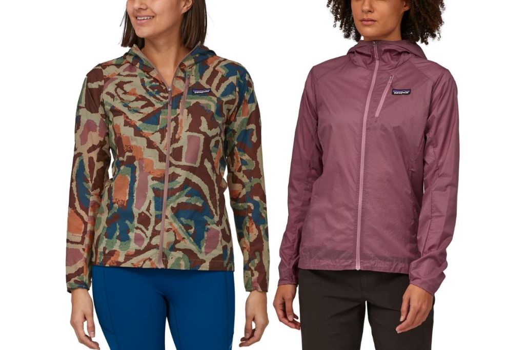 two models wearing Women’s Patagonia Houdini Jacket stock images