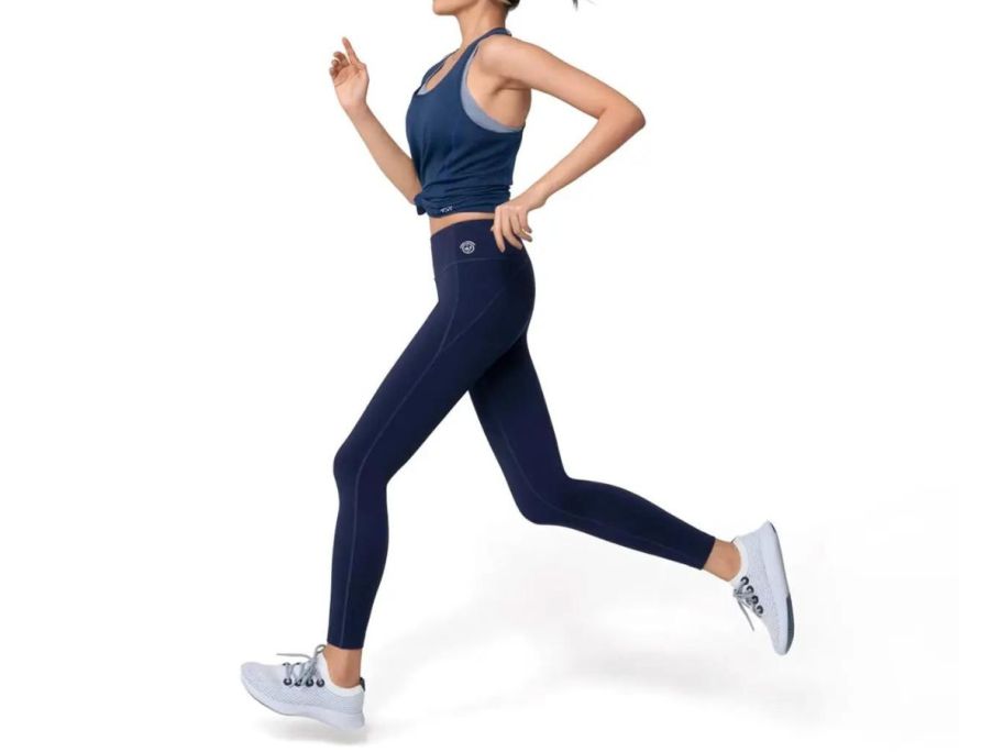 woman running in allbirds Women's Natural Legging