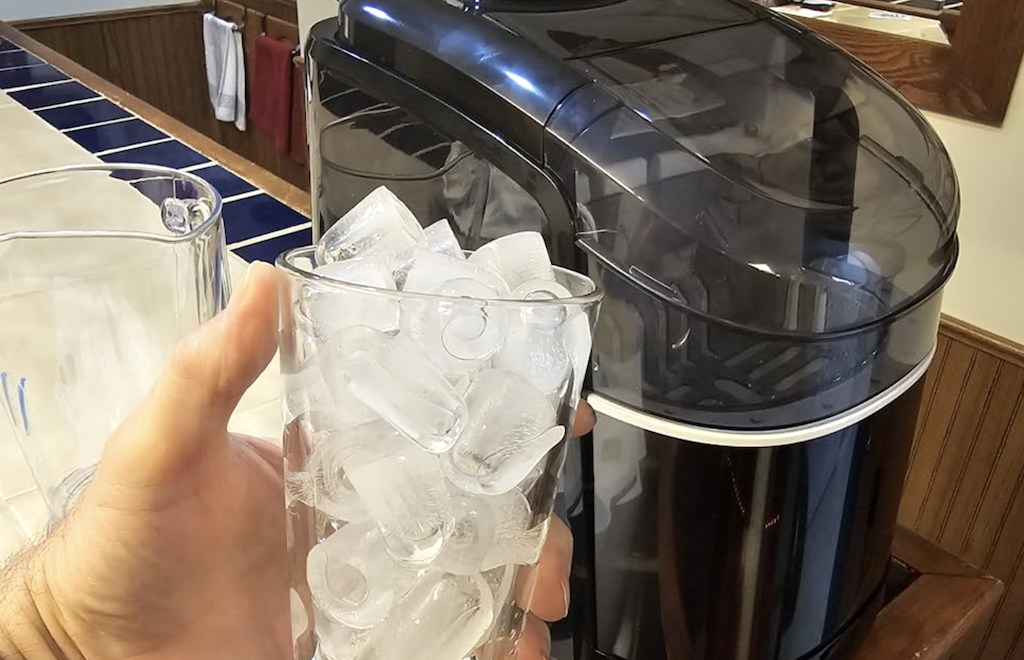 glass with ice and ice maker