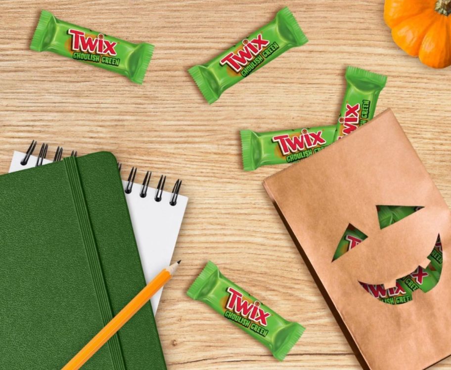 twix snack size ghoulish green halloween candies on a desk top