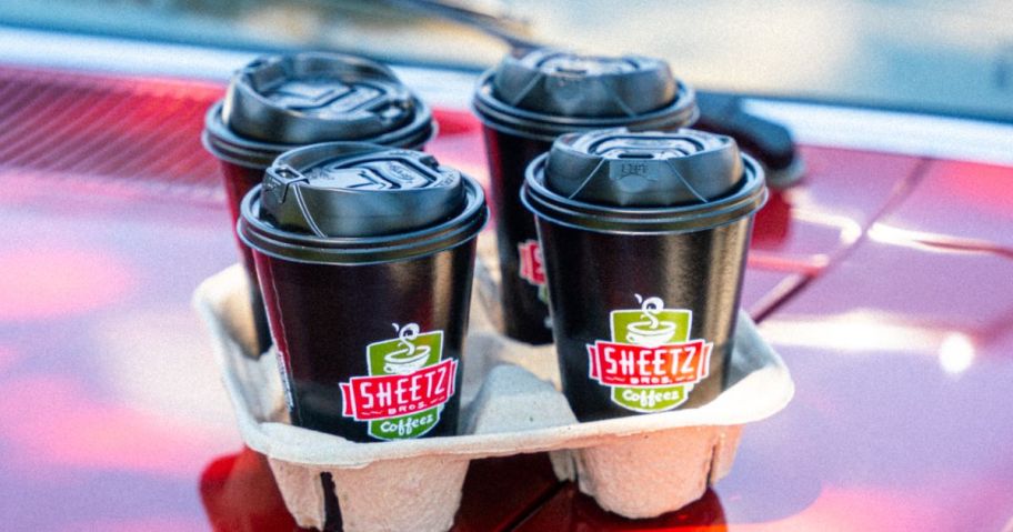 sheetz coffees in a paper carrier on car hood