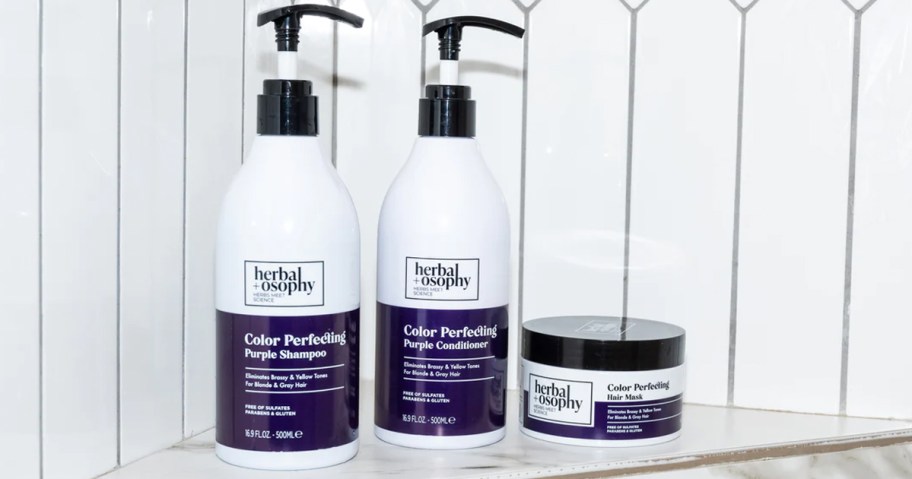 Herbalosophy Color Perfecting Purple Shampoo & Conditioner Set in shower