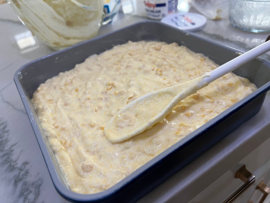 Jiffy Cornbread Casserole batter in a baking dish