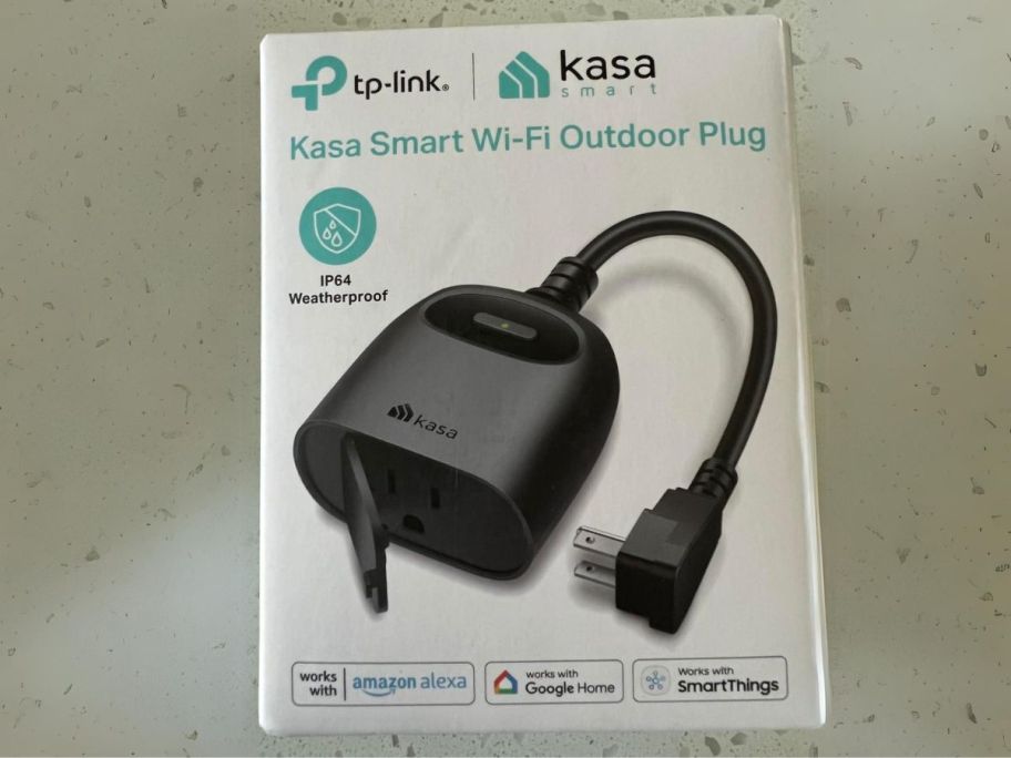 Kasa Outdoor Smart Dimmer Plug box on counter