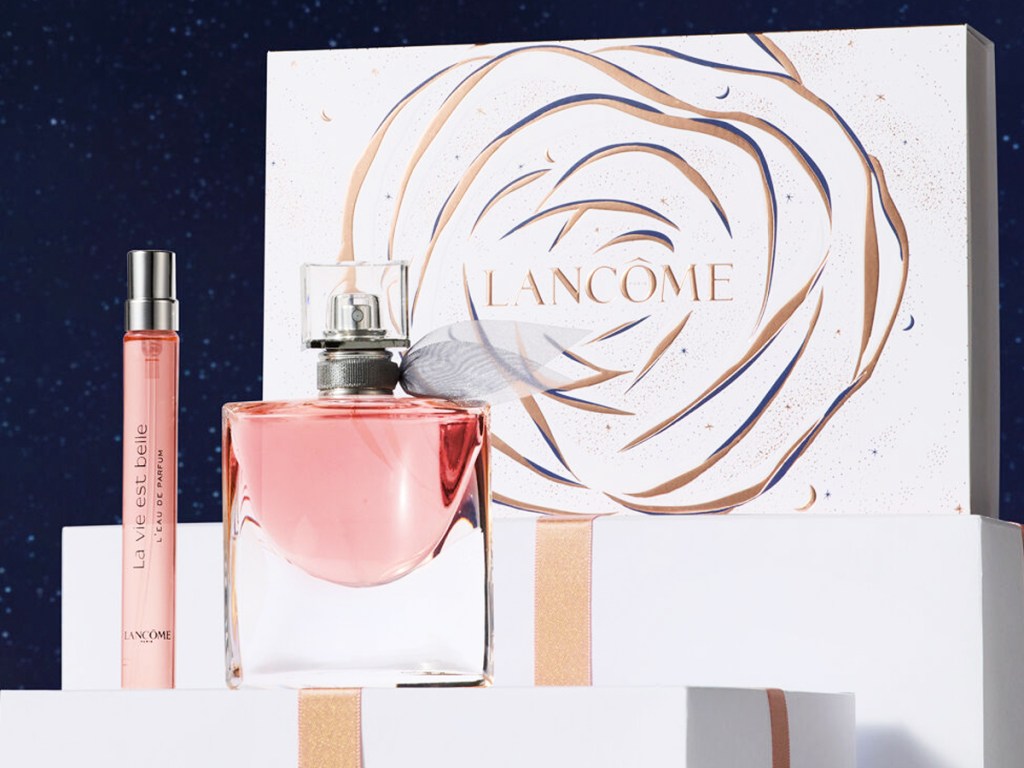 large bottle and travel size bottle of Lancome La Vie Est Belle perfume