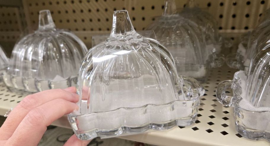 hand holding Pumpkin-Shaped Glass Butter Dish