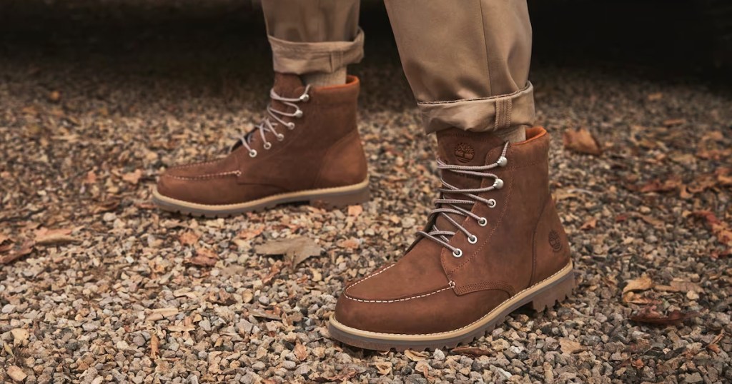 man wearing a brown pair of Timberland boots