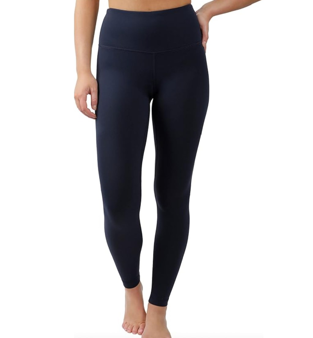 woman in navy leggings that look like lululemon