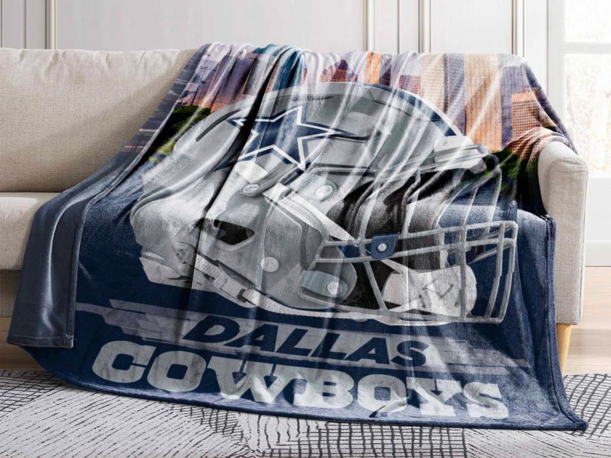 cowboys oversized throw spread across a sofa