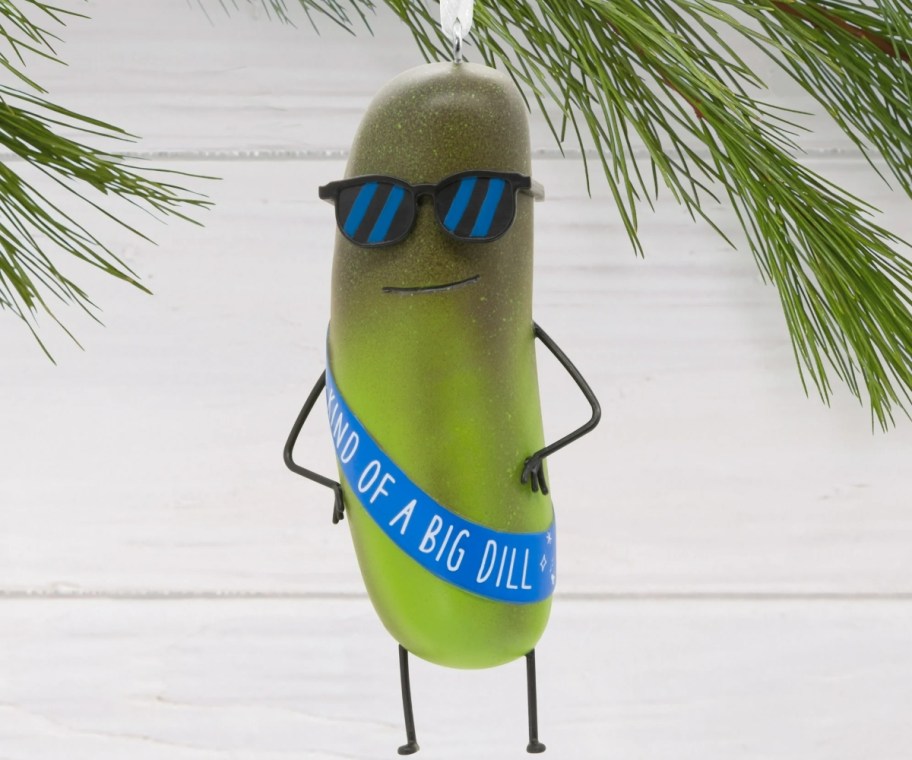 pickle ornament on evergreen tree 