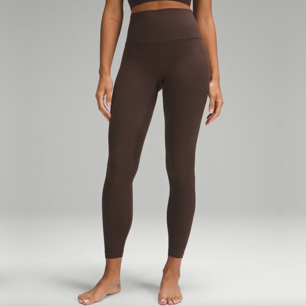 woman in brown leggings