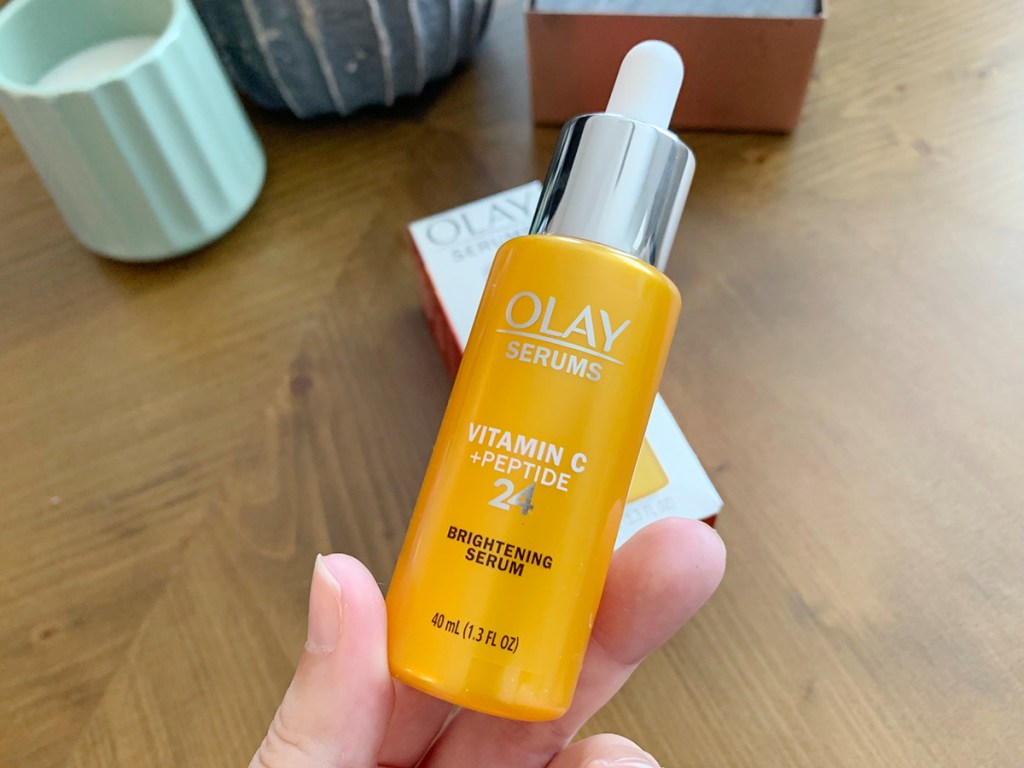 hand holding olay vitamin c serums