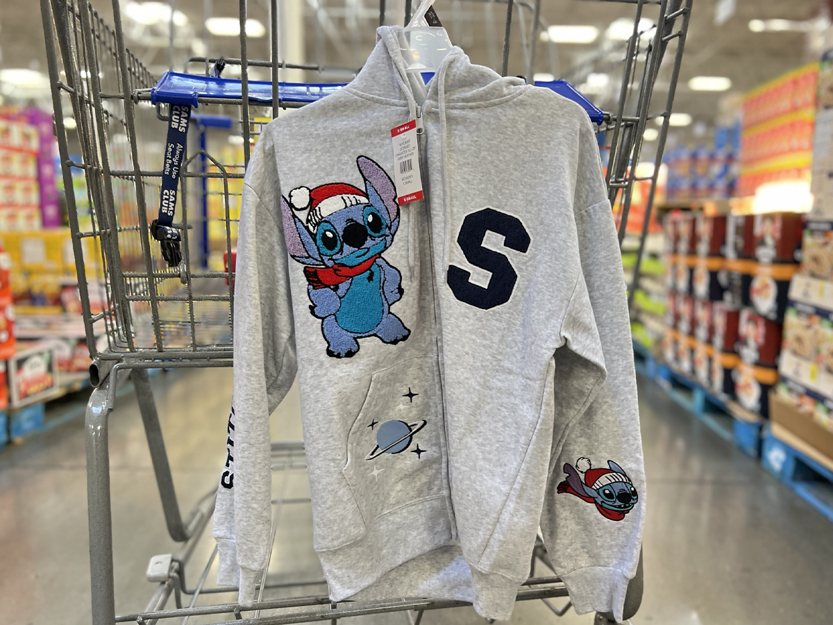 stitch zip up jacket hanging on cart